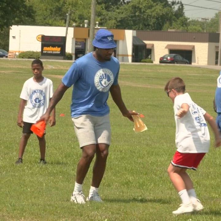 Cats, Cards coach local kids at J.J. Weaver's Perfect Fit Football Camp